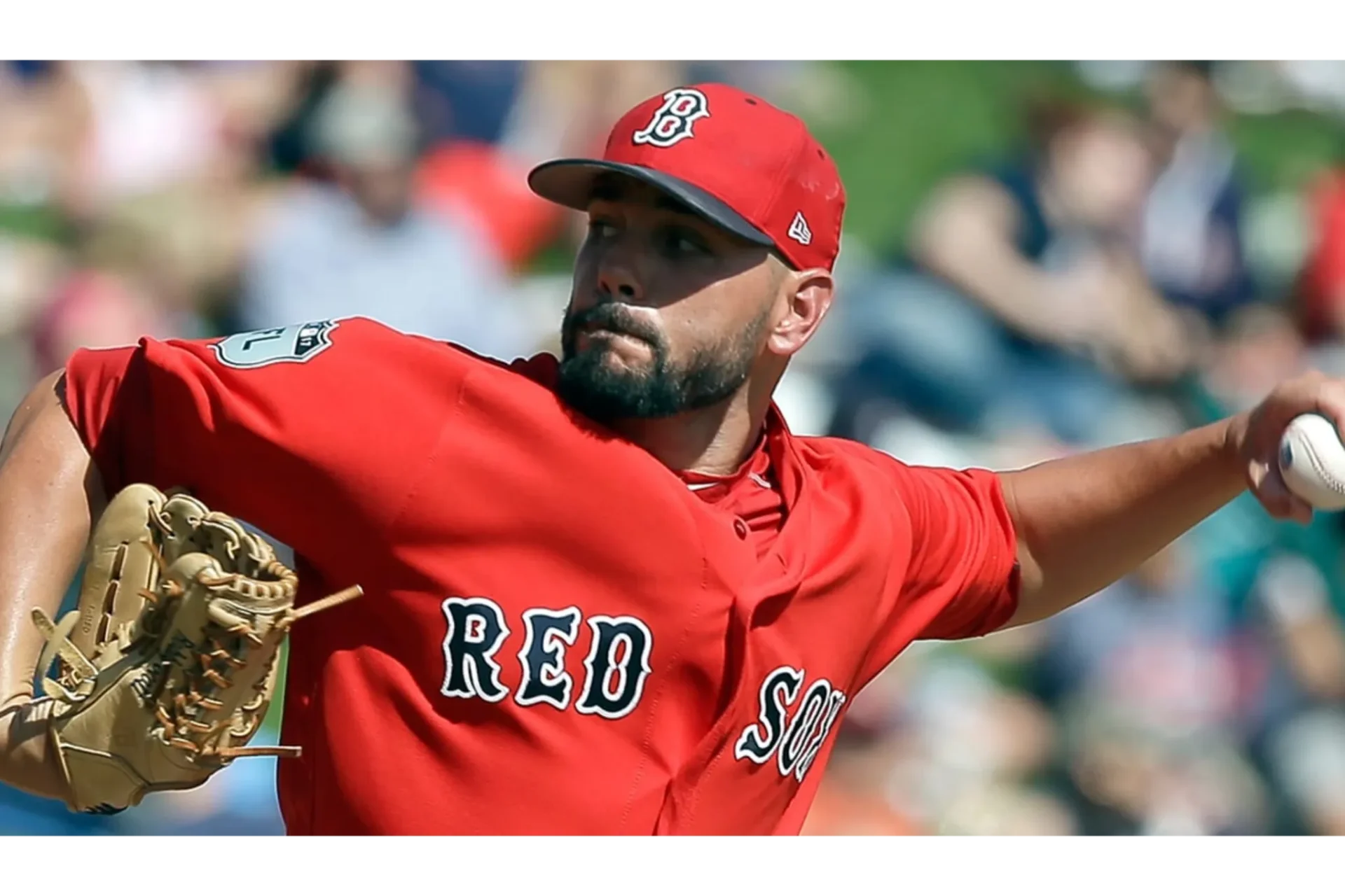 A baseball player is throwing the ball