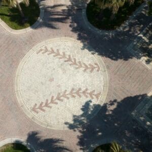 A baseball is shown in the center of a circle.